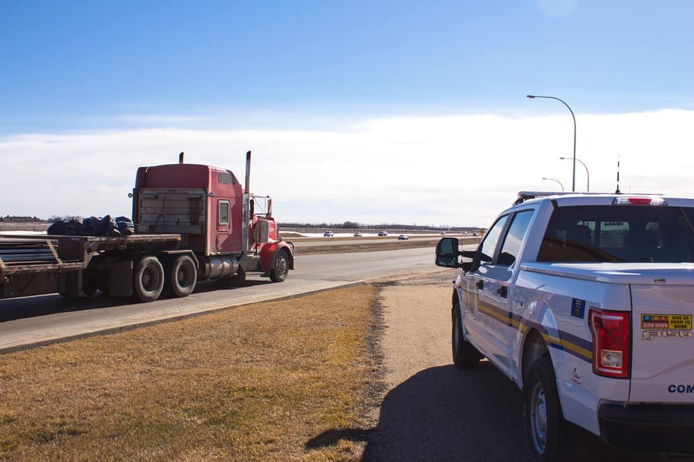  Most trucks will be required to have electronic logging devices installed by December. The devices automatically record driver's hours of service.  