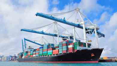 A Cargo ship unloads at PortMiami. (Photo: Shutterstock)