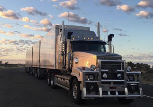  B-Triples run on interstates in remote areas of Australia - same 4-lane design as here. This truck hauls 44 4’x’4’ pallets of freight and offers a lot of operational flexibility. Operators can drop the front trailer and go everywhere an 18-wheeler does in the U.S., or if things get really quiet with freight, you just drop the front 2 half-trailers and haul the 45’ rear trailer around as a normal tractor-trailer combo. One B-Triple is almost the equivalent of two 18-wheelers on the road, so fewer trucks means more revenue per mile for LCV operators, less accidents and fewer greenhouse emissions. Engine Power is key as the combo to has to maintain close to the same road speed as other road users so there’s isn’t a major speed differential that creates a safety hazard.  (Photo: Dean Croke)  