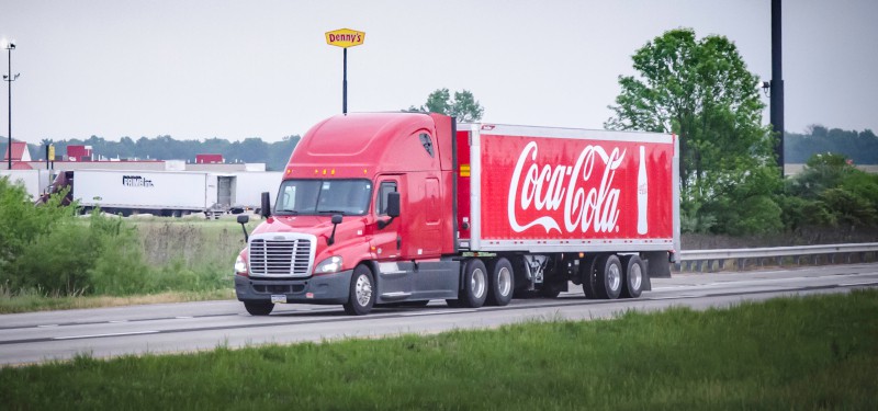  Branding your trucking company doesn’t mean you must fully wrap trailers with your company name like Coca-Cola does, but it does require incorporating a branding campaign into your operation. ( Photo: Truckstockimages.com ) 