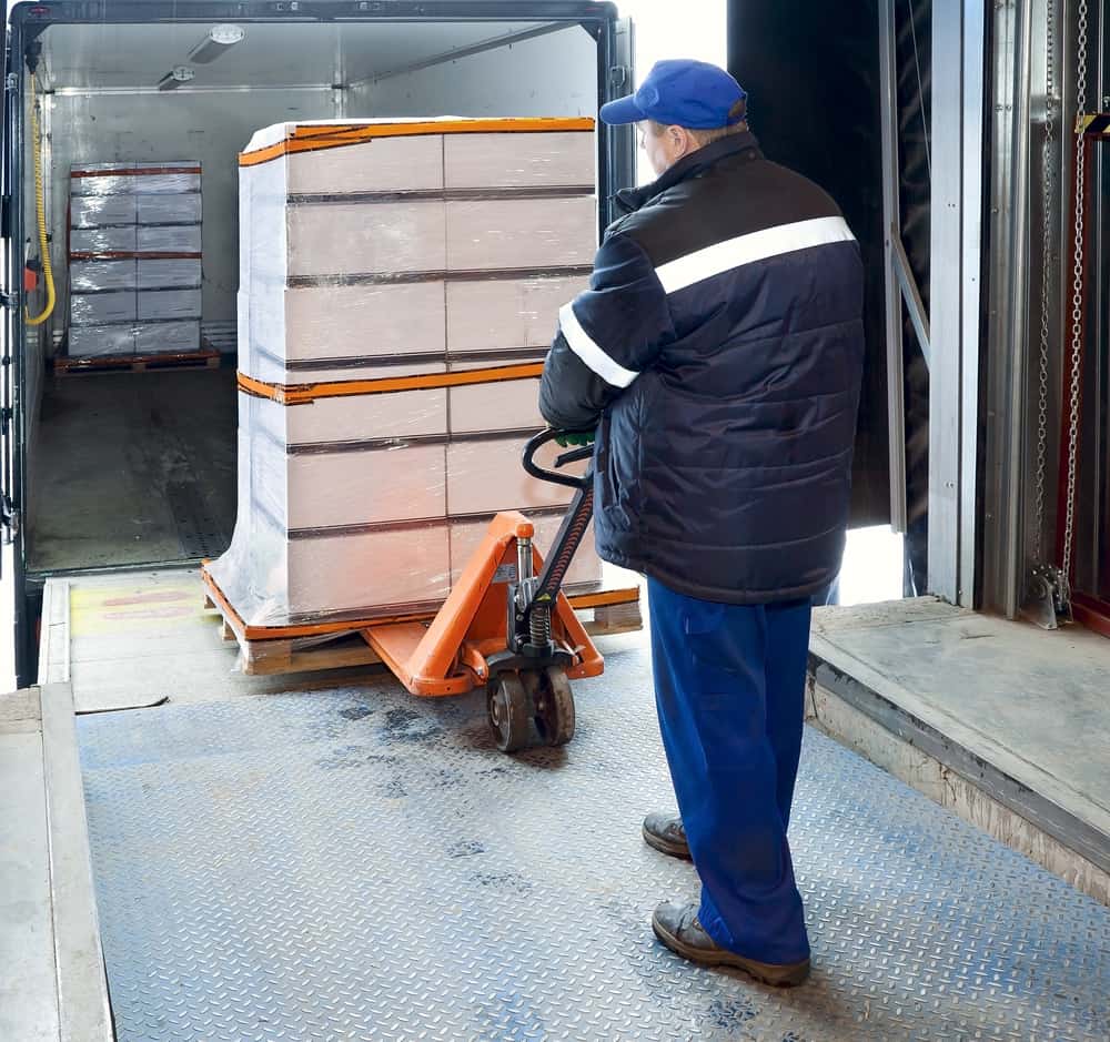 A truck being loaded at a dock. (Photo: Shuterstock)