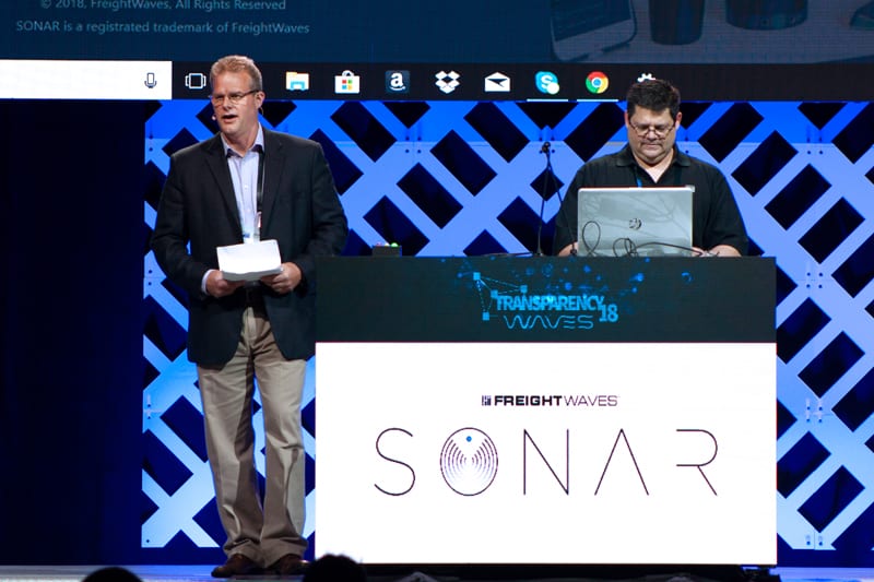  Ben Murphy drives the demo laptop during SONAR’s public debut at Transparency18 last May. ( Photo: FreightWaves ) 