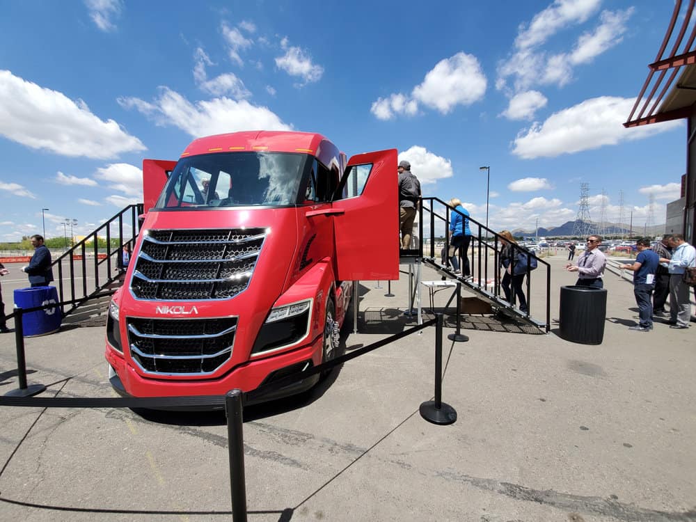  This red Nikola Two tractor model was open for attendees at Nikola World 2019 to walk through. The tractor was hooked up to an Anheuser-Busch trailer. ( Photo: Brian Straight/FreightWaves ) 
