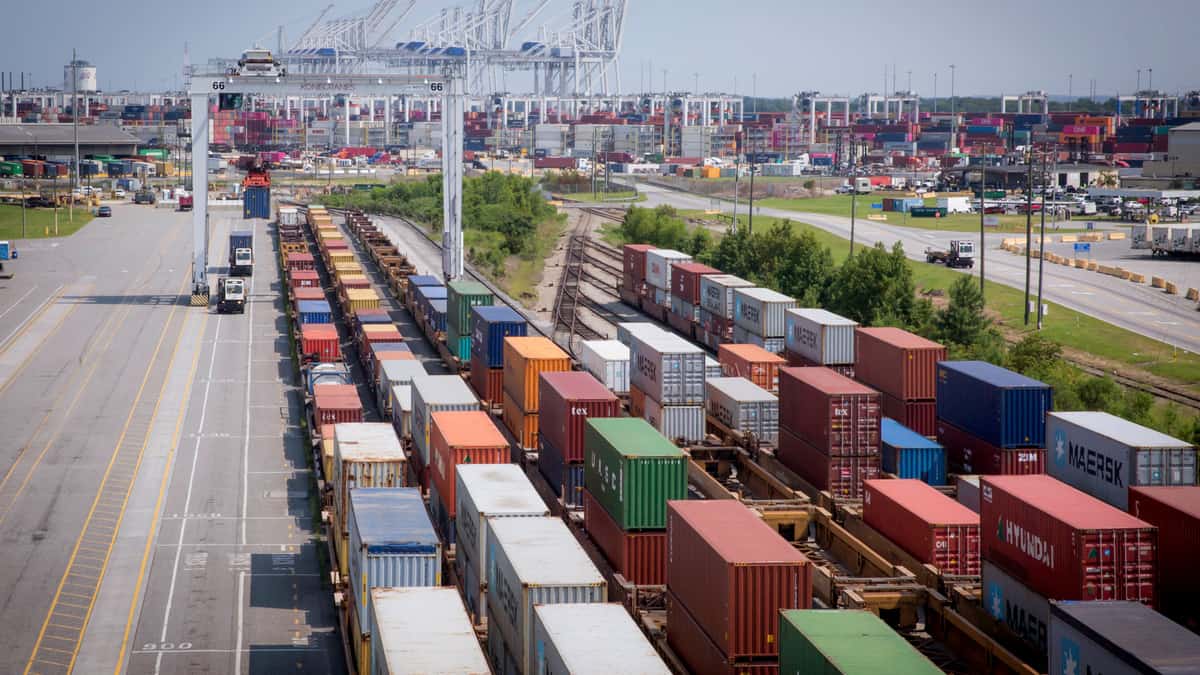 A photograph of five long lines of containers lined up next to each other.