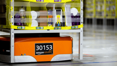 An Amazon Robotics Drive unit moves inventory in a warehouse.