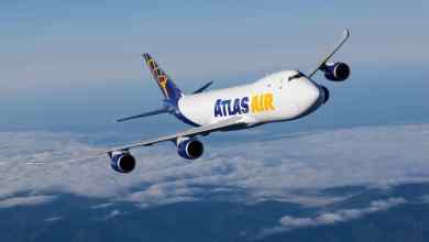 Atlas Air plane flying above the clouds