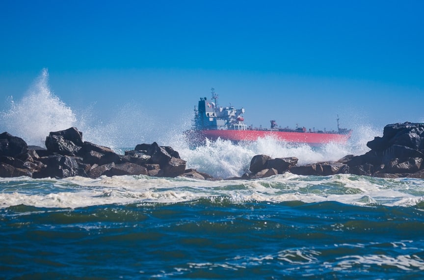 Storm surge damaging breakwater