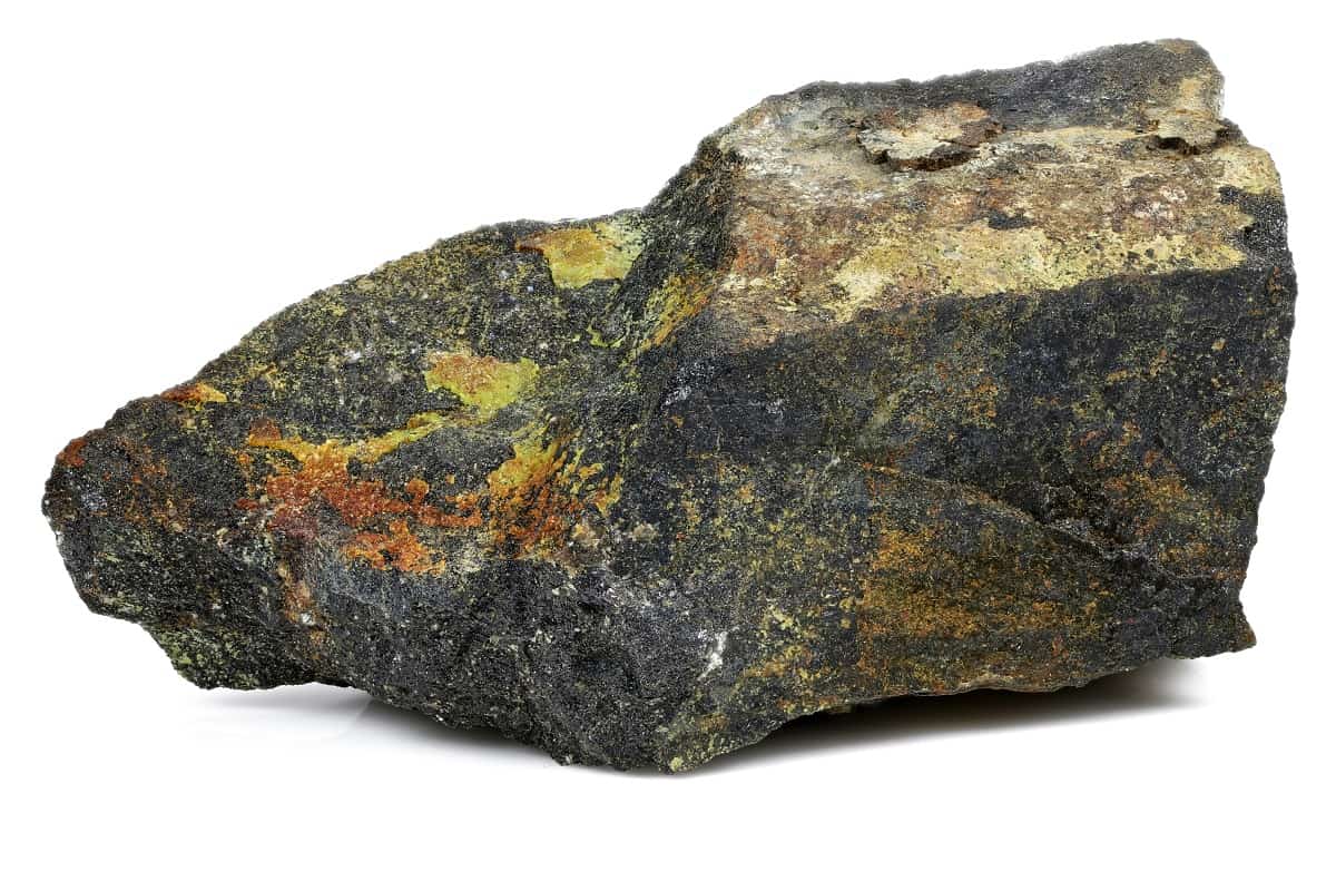uranium ore -pitchblende with uranophane- from Australia isolated on white background. Photo by Shutterstock.