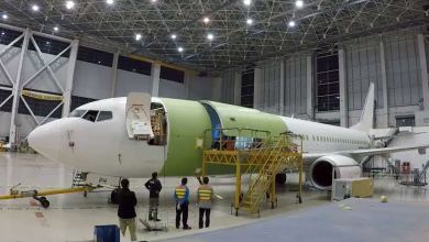 An older Boeing 737 gets ripped up in the shop and modified to carry cargo.