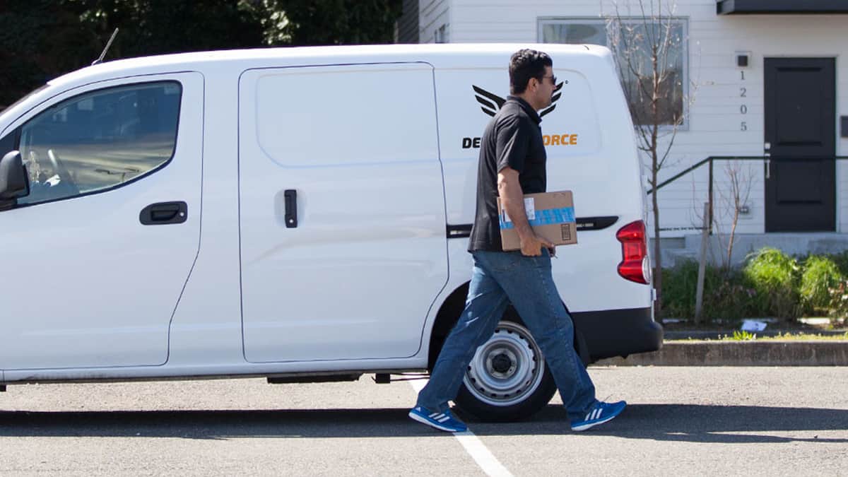 White van parked for home delivery.