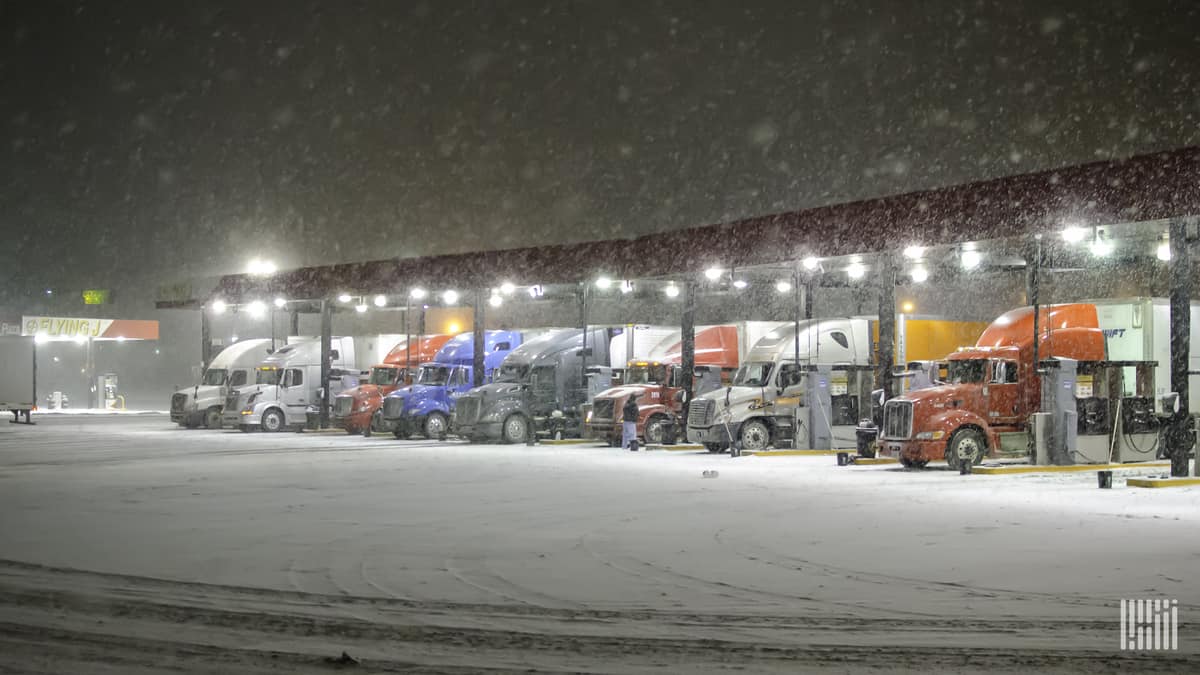 Trucks fueling at travel center