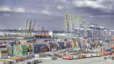 Stacks of shipping containers at a major port