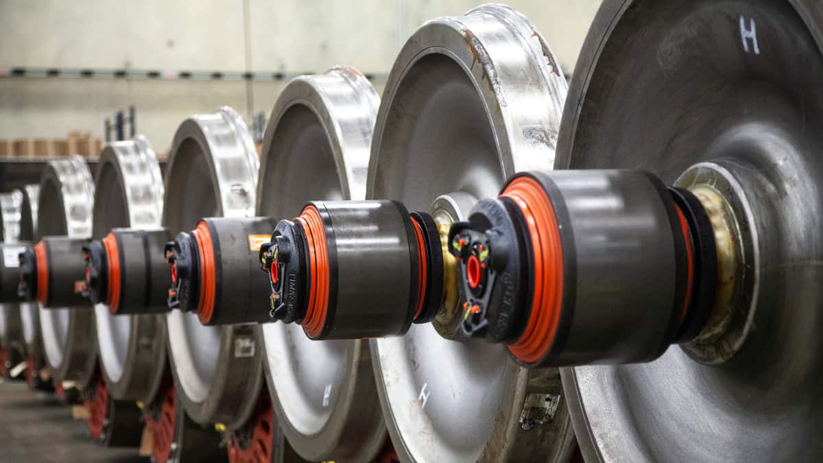 A photograph of wheel components for a train.