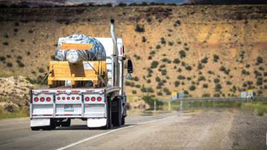 flatbed rig on highway