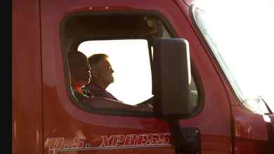two men is U.S. Xpress cab