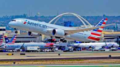Big silver plane takes off from Los Angeles Airport