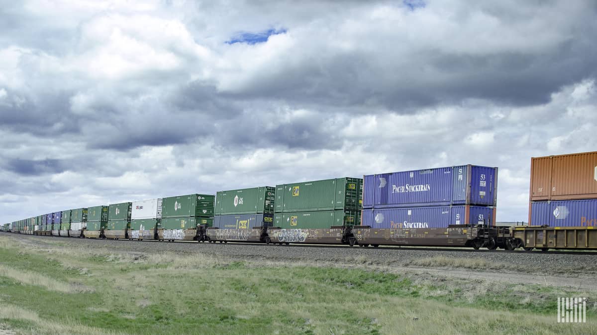 A photograph of a train carrying intermodal containers.