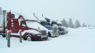 Tractor-trailers stopped at snowy Donner Pass, California.