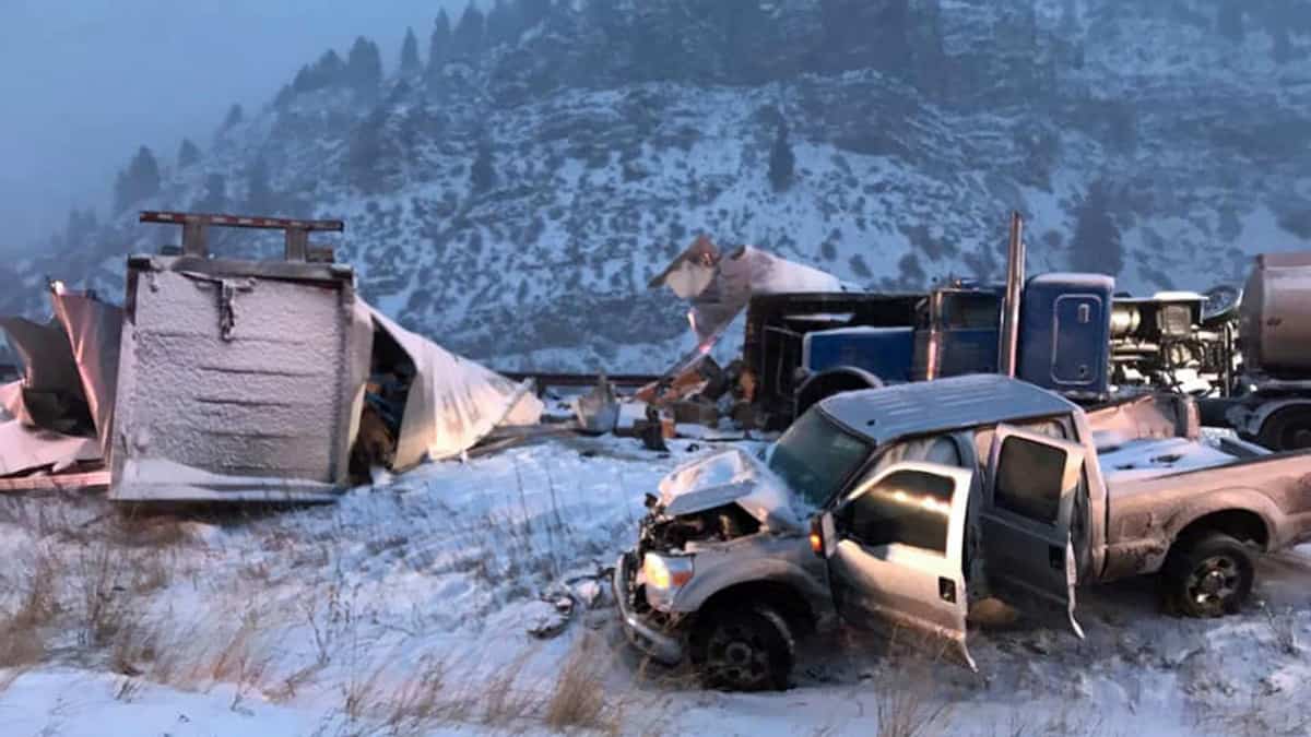 Tractor-trailer wreck on snowy Colorado highway.