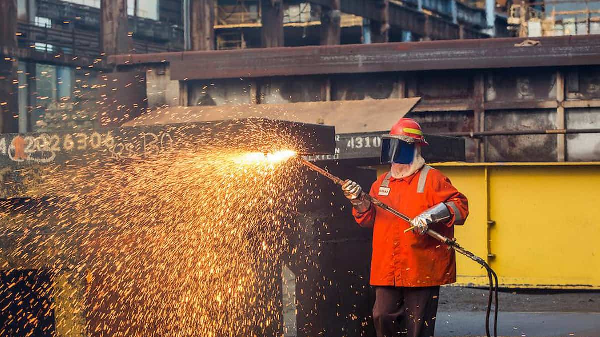 A worker at the EVRAZ steel plant in Regina, Canada