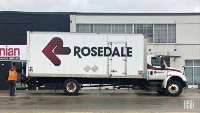 A driver from Rosedale Transportation Group makes a delivery to a carpet store in Toronto