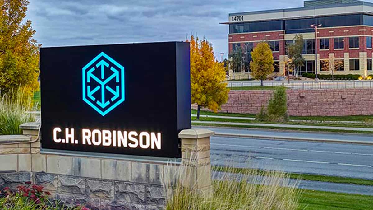 The logo of C.H. Robinson on a sign in front of a building