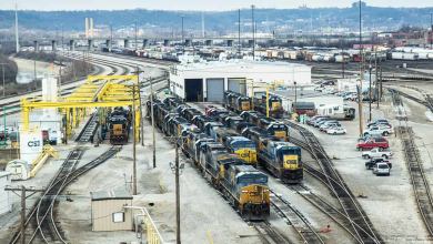 A photograph of locomotives at a rail yard.