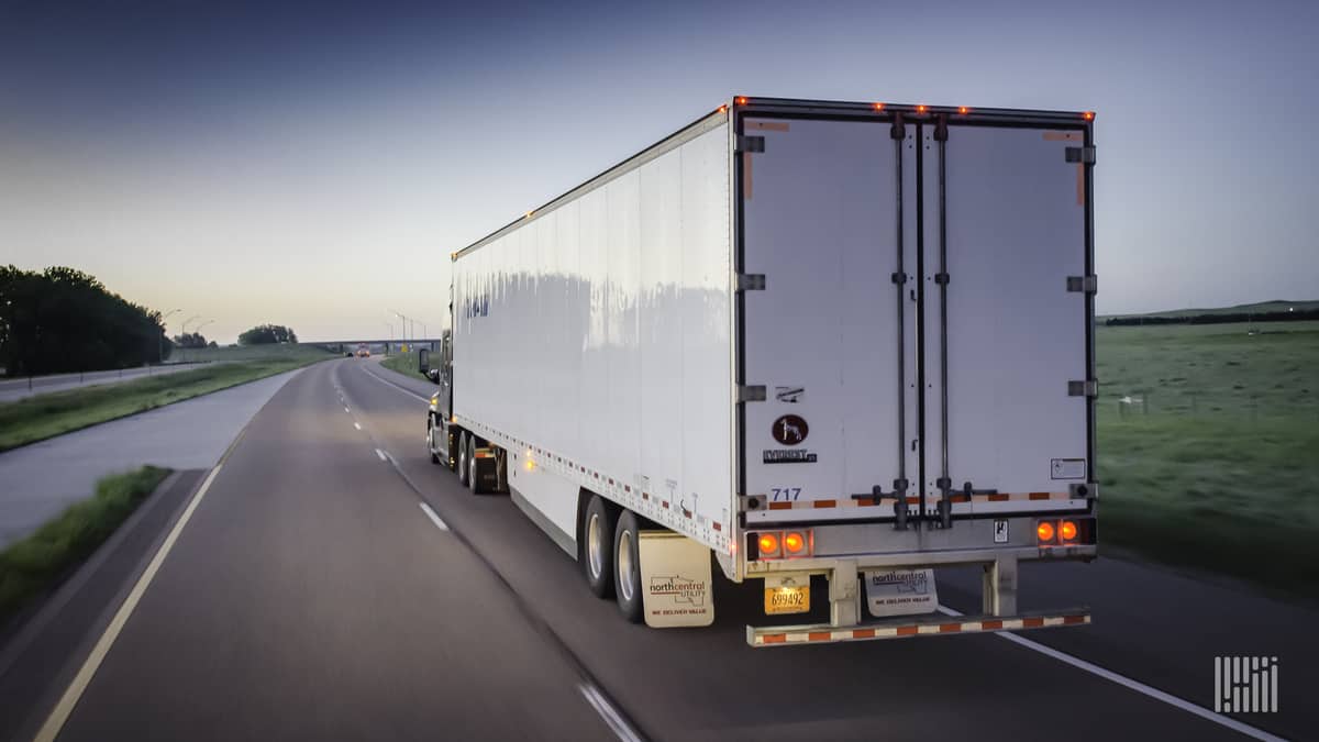 Unidentified trailer moving down highway