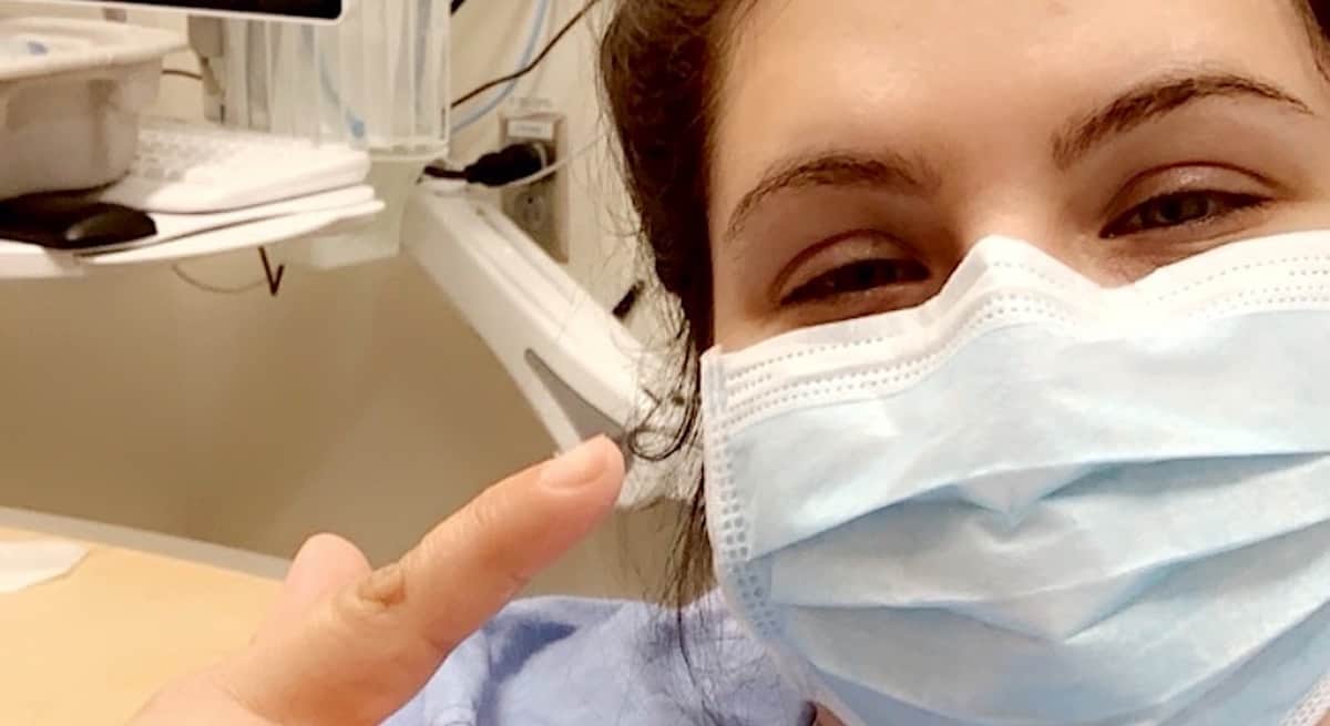 Canadian truck driver Nicole Folz wearing a medical mask at a hospital in Toronto