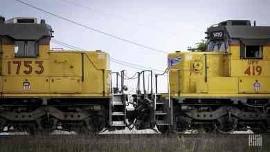 A photograph of two railcars.