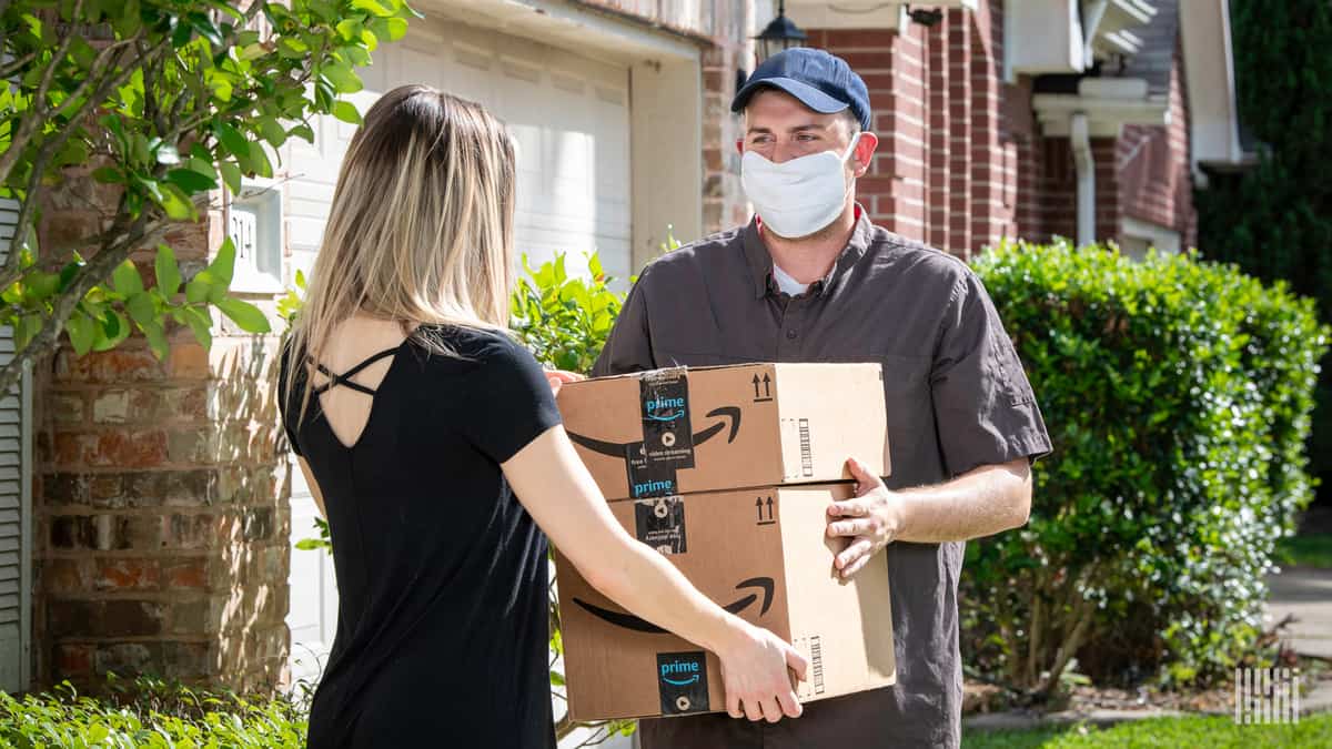 Delivery driver delivering package