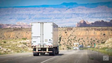 Truck driving on desert highway
