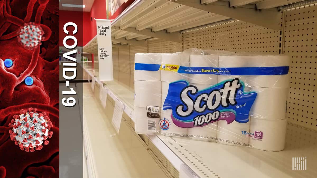 a pack of toilet paper on an otherwise empty store shelf