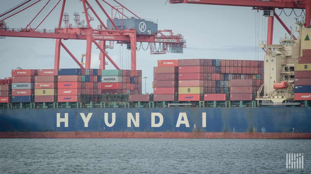 A Chinese container ship's cargo is unloaded. 