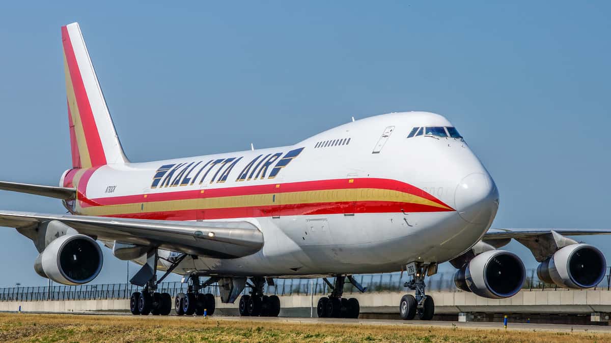 A Kalitta Air cargo plane on an airport runway.