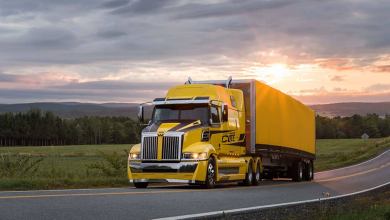 Yellow Western Star truck on aroad