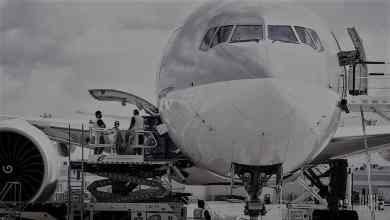 Black and white cargo plane in loading process