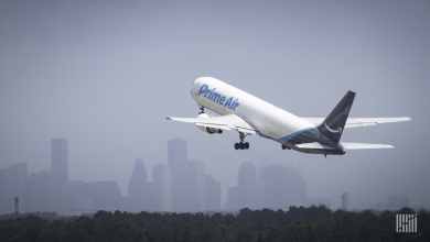 An Amazon Air plane takes off, view from behind as it gets airborne.
