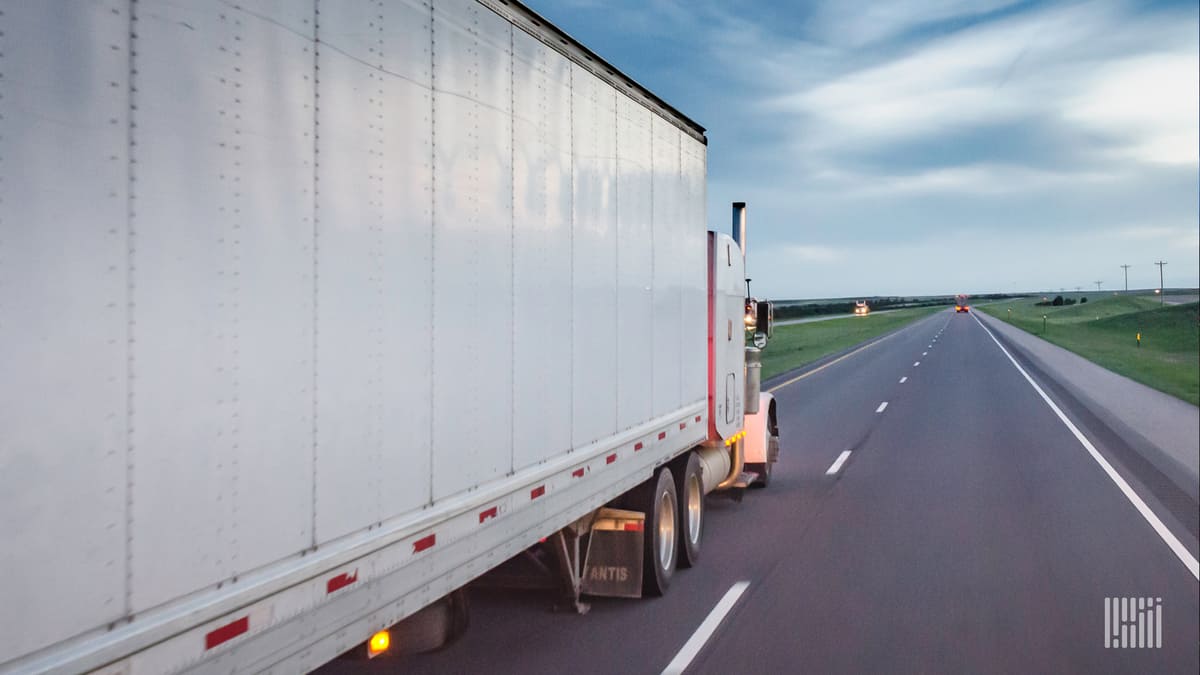 A truck moves down the highway on a cloudy day.
(Photo: Jim Allen/FreightWaves)