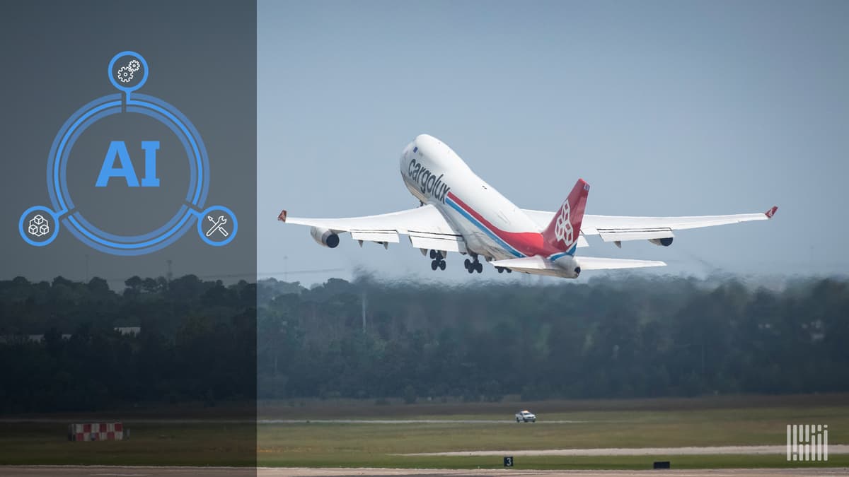 A CargoLux freighter takes off from an airport.
