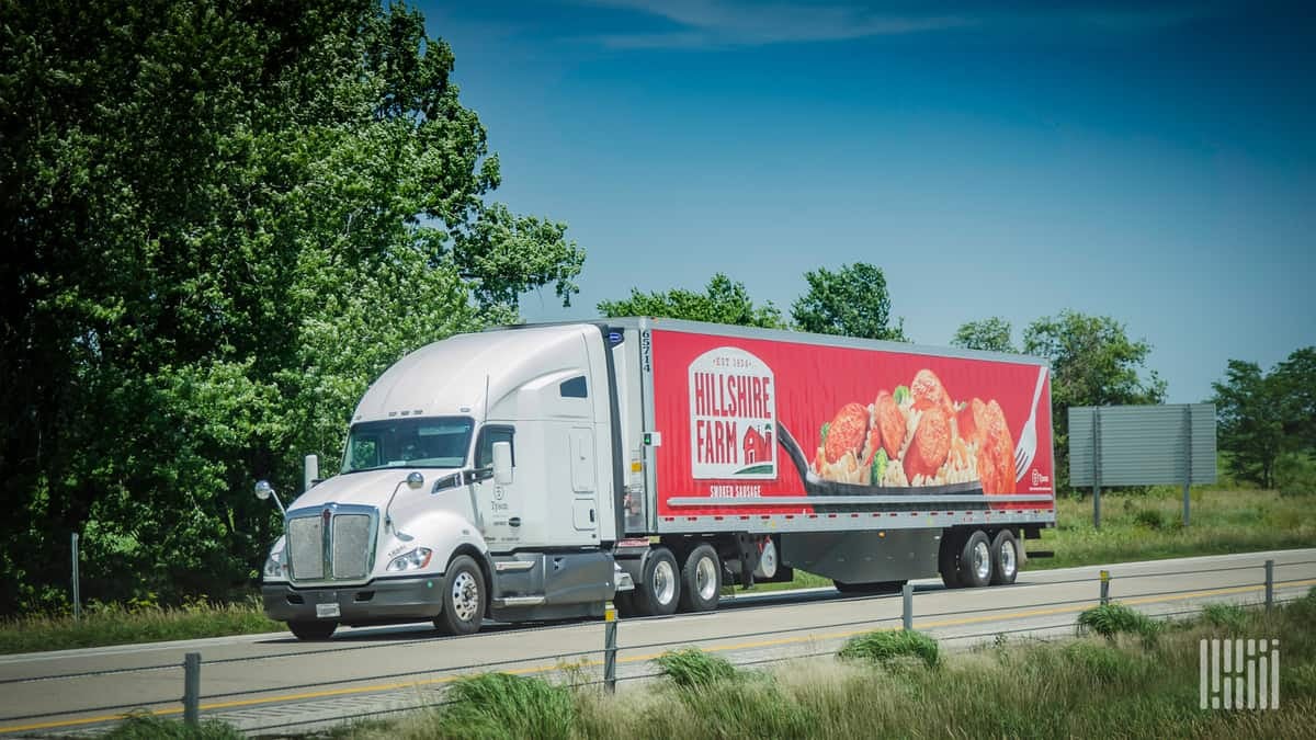 A truck from the Hillshire Farm fleet is driven down the road.