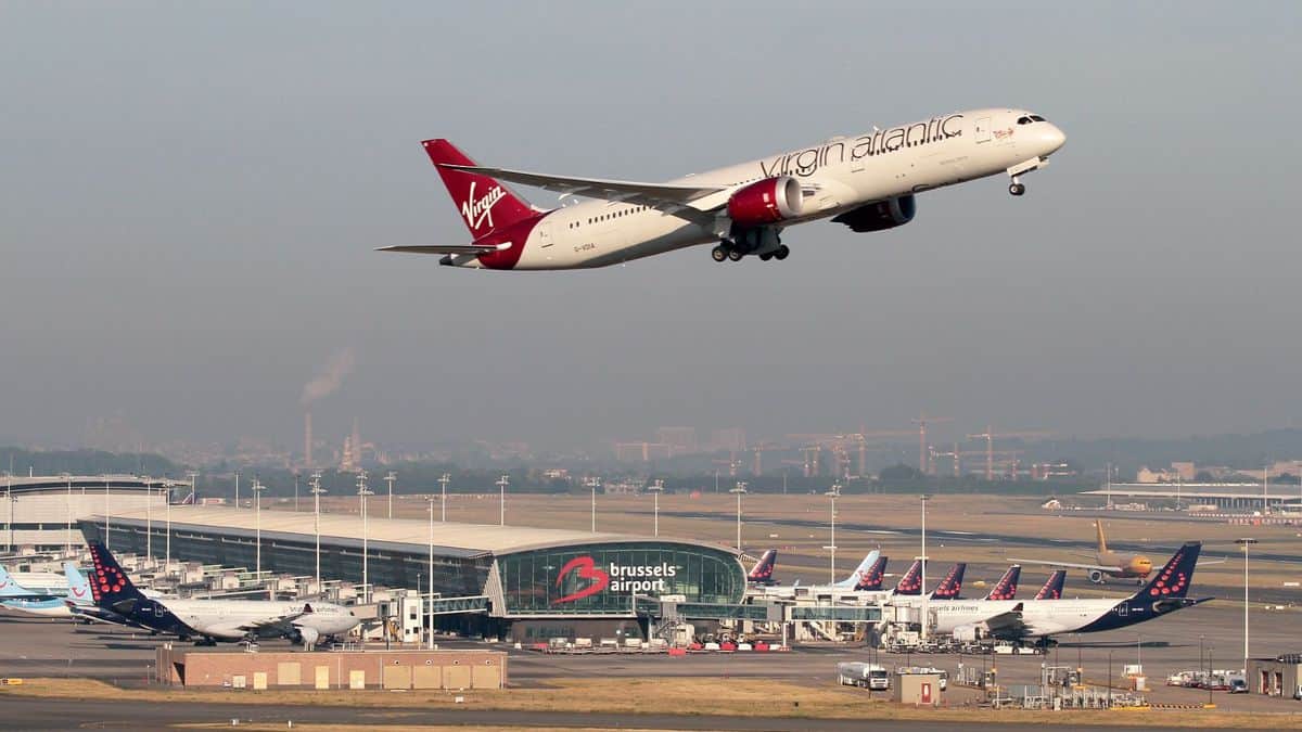 A white and red Virgin Atlantic plane takes off from Brussels Airport. The airport saw positive cargo growth in June for the first time since February.