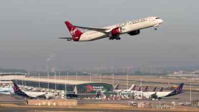 A white and red Virgin Atlantic plane takes off from Brussels Airport. The airport saw positive cargo growth in June for the first time since February.