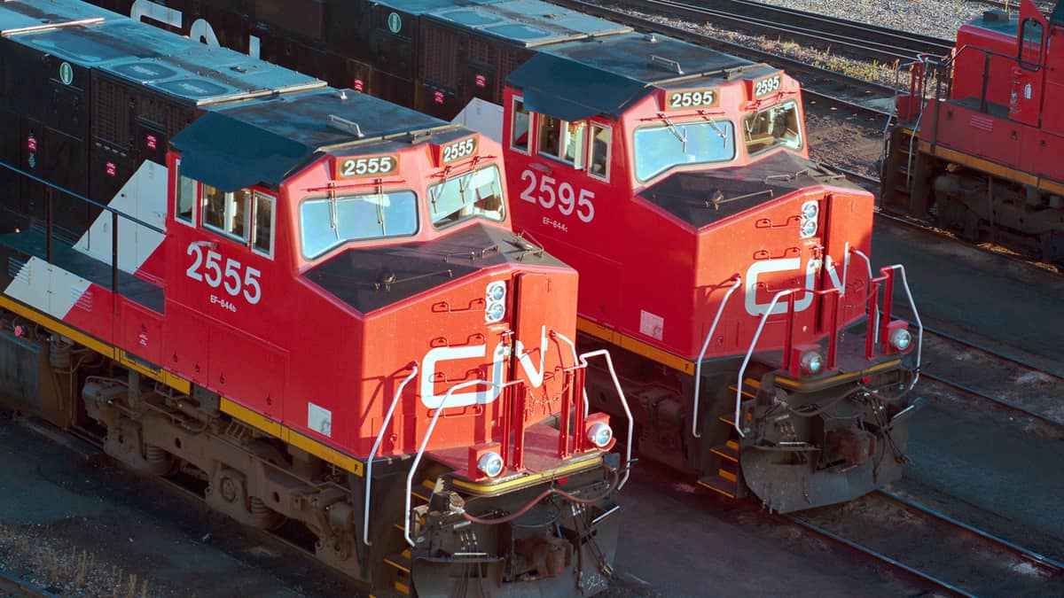 A photograph of two freight train engines.