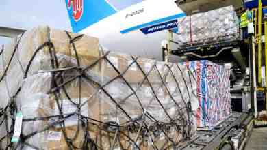 Cargo pallets come off a the rear door of a big cargo plane. China cargo capacity is shrinking and rates are going back up, according to the latest data.