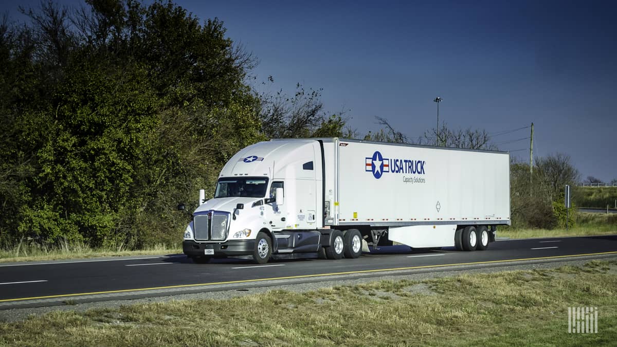 USA Truck rig in transit on highway