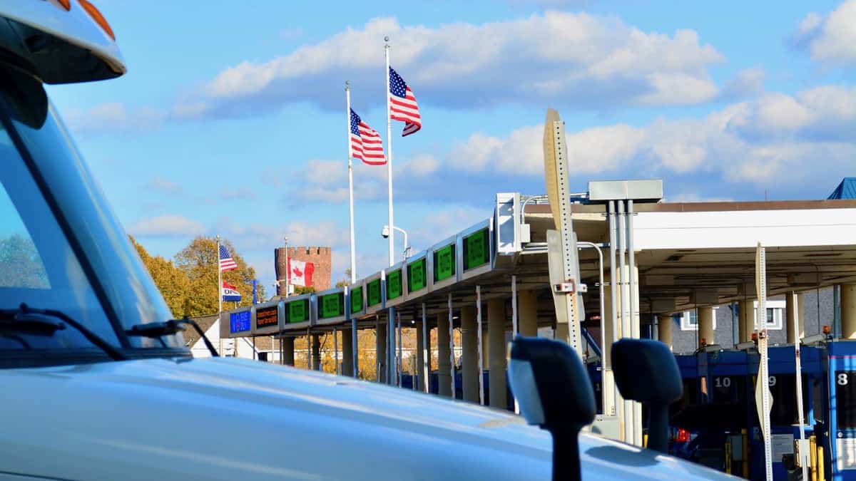 A truck prepares to enter the United States from Canada via the Peace Bridge border crossing near Buffalo, NY. Criminal charges were recently dropped against a truck driver accused of attempting to smuggle $20 million of marijuana from Canada to the United States.