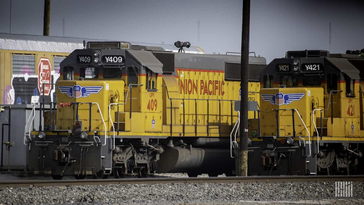 A photograph of a train at a rail yard.