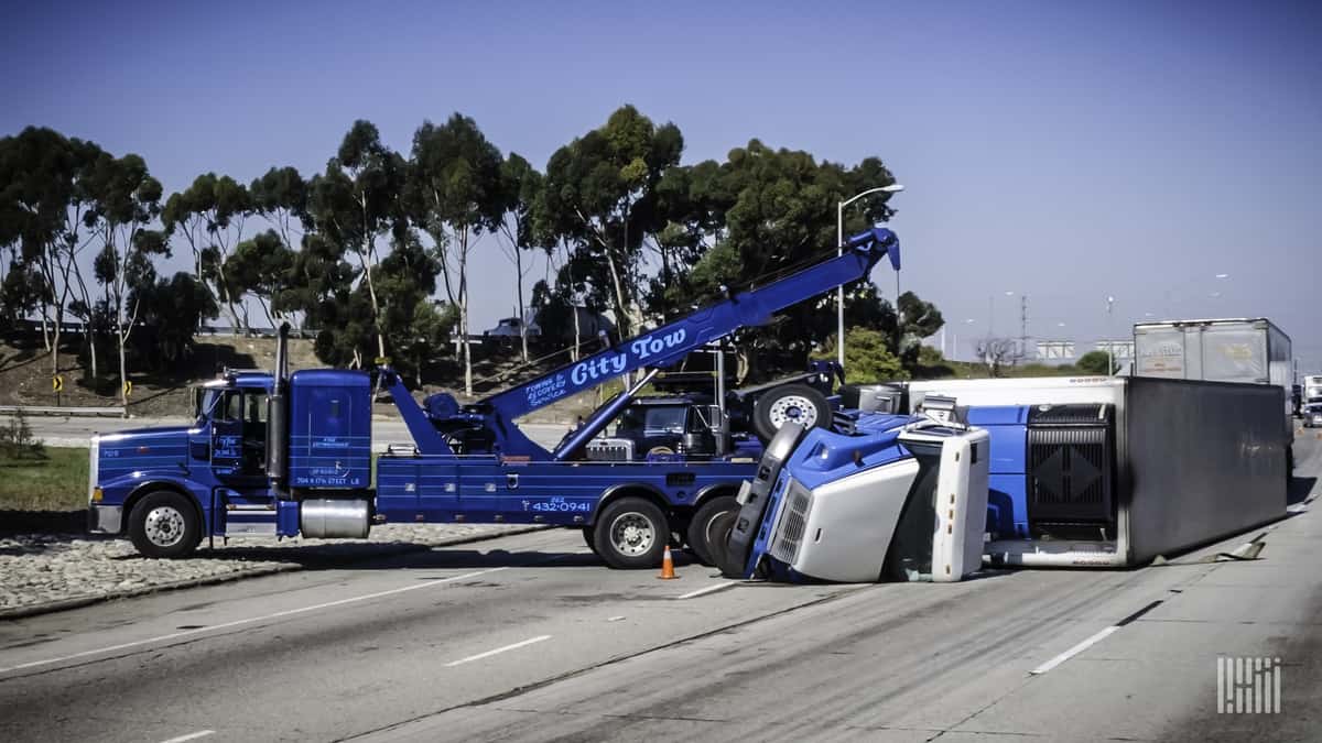 Tow truck responds to wreck.