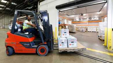 A forklift operator moves packages of blood at Lufthansa's cold storage facility in Chicago.